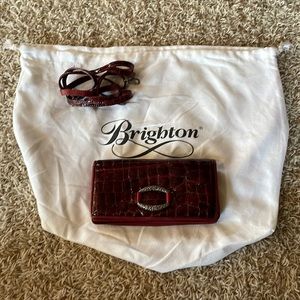 Brighton wallet with strap. Excellent condition.